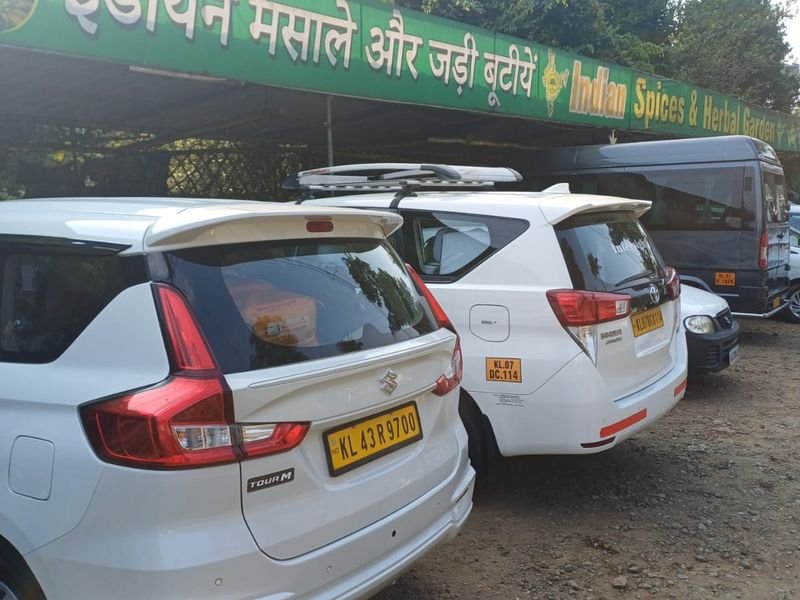 Cabs Parked at Munnar back and side views