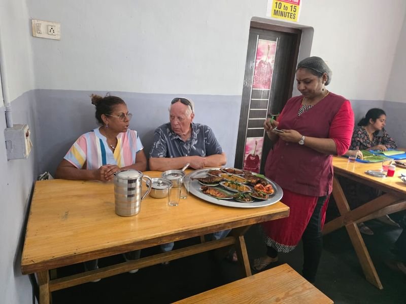 Foreign tourists enjoy their time during lunch