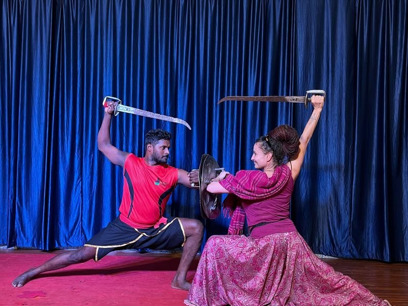 Foreign traveler performing  Kalarippayattu